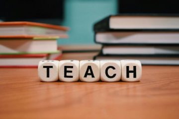 Letter tiles that read TEACH.